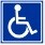 Symbol niepełnosprawności to ikona osoby siedzącej na wózku inwalidzkim. Znak przekazuje informacje o dostosowaniu różnych miejsc dla osób niepełnosprawnych. Ikona osoby jest biała na niebieskim tle.
